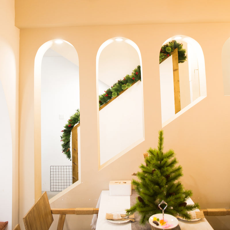 Classic Christmas Pine Garland with White Cones and Red Berries